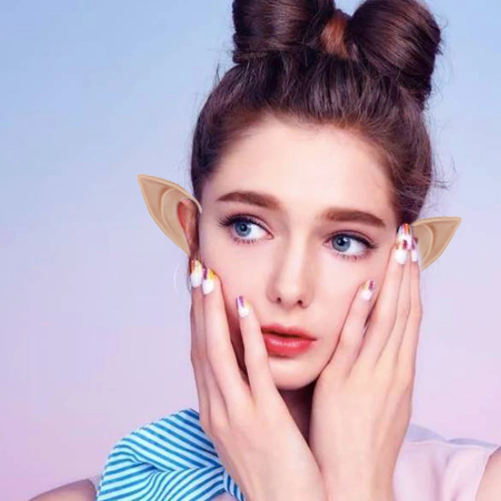 Person wearing elf ears with a pastel background