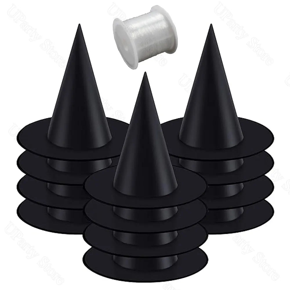 Set of black traffic cones with a spool of white rope on a white background